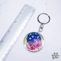 Sweet Plushie Dreams Dragon | Holographic Acrylic Keychain(Sweet Plushie Dreams Dragon Holographic Acrylic Keychain) -Dragons' Garden Dragons Garden Summer Mysteries moon plush dragon acrylic key 1